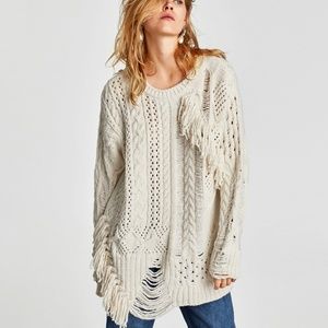 CABLE KNIT SWEATER WITH FRINGE